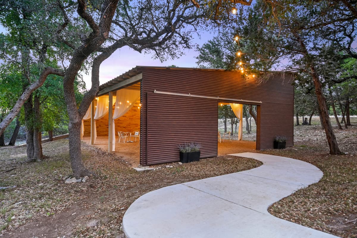 The modern open-air wedding pavilion at Prima Vista provides a stunning weather backup plan