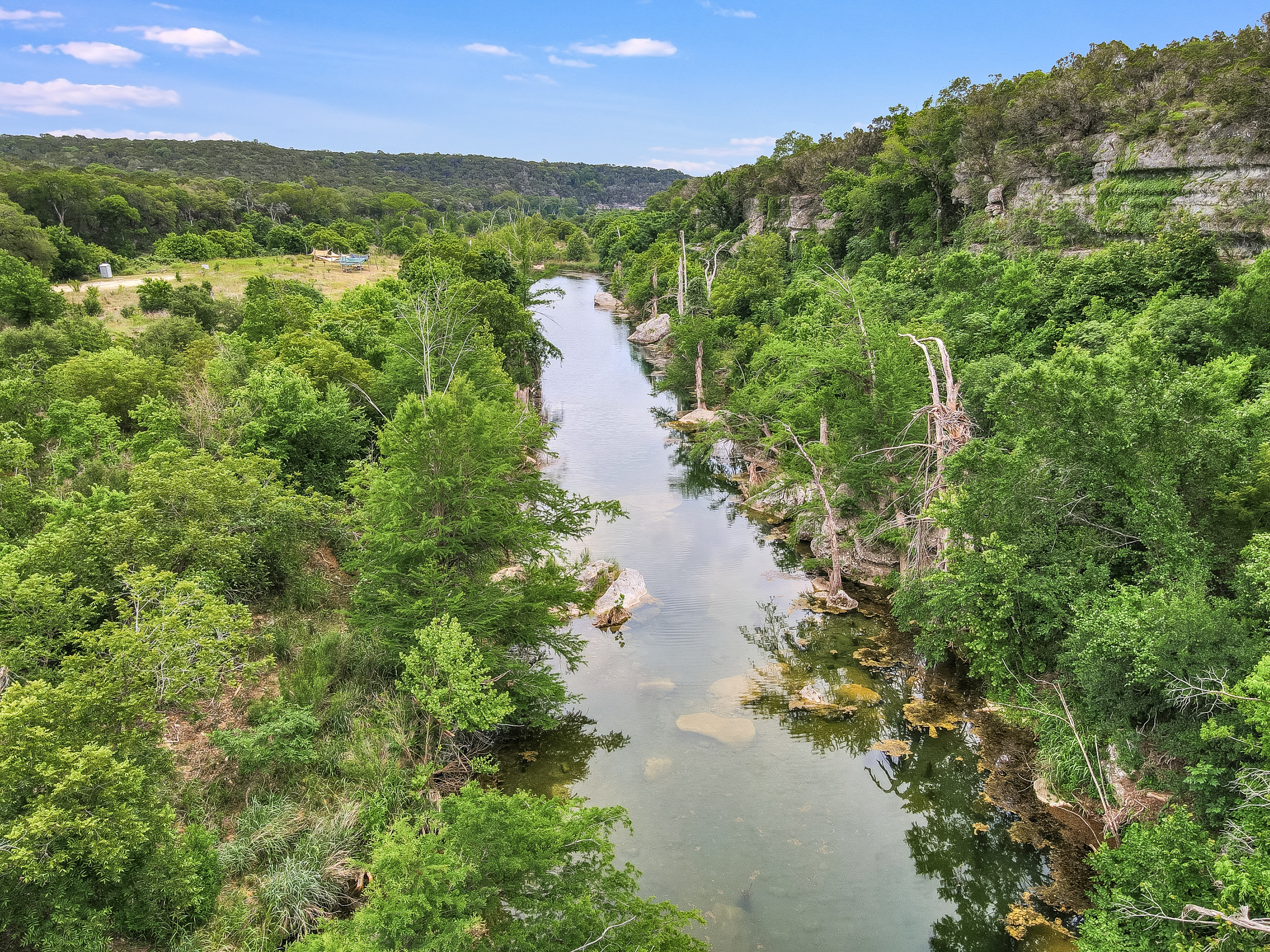 The expansive natural beauty of the Texas Hill Country and river view at Prima Vista